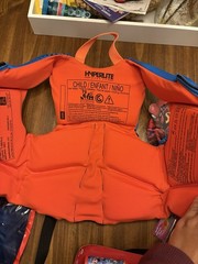 Kids life jacket hyper lite 33-55 pounds and extras water gun jump robe pop it