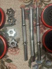 Dumbells That Can Become A Barbell With 4 Plates Of 2.5KG And 4 Plates Of 1.25KG