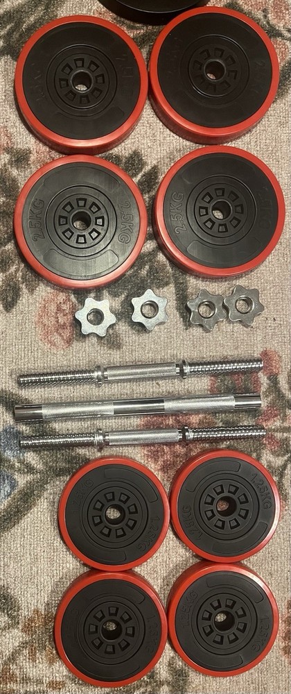 Dumbells That Can Become A Barbell With 4 Plates Of 2.5KG And 4 Plates Of 1.25KG