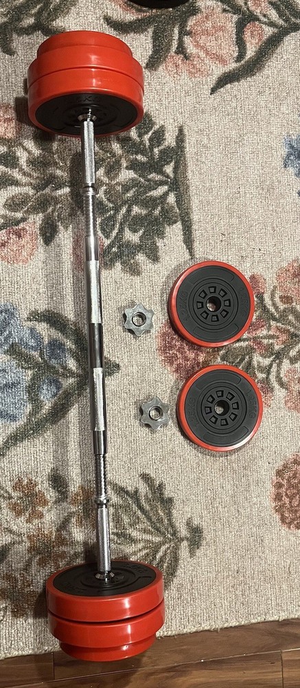 Dumbells That Can Become A Barbell With 4 Plates Of 2.5kg And 4 Plates Of 1.25kg