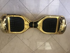 IScooter Electric Scooter. Weight 12kg; Voltage 36V; Max Speed 12km/h; Gold